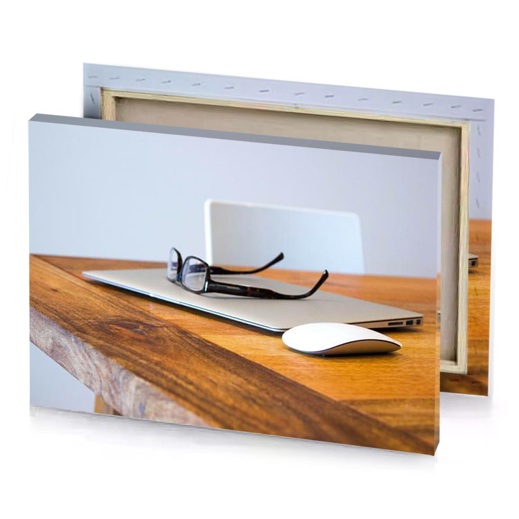 a laptop and mouse on wooden table peru canvas