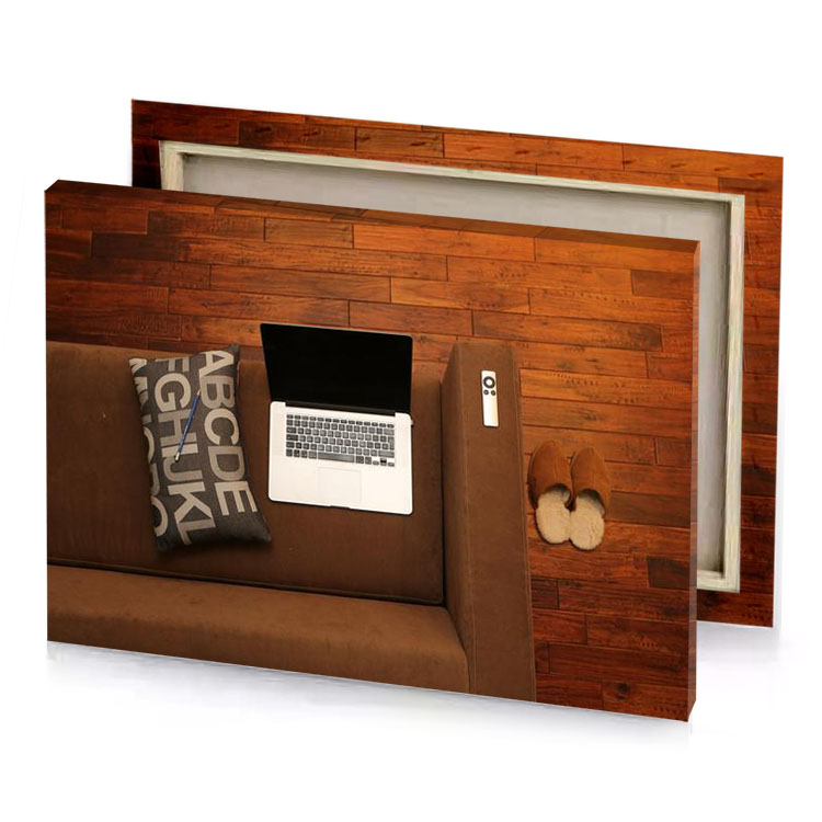 a laptop and pillow on couch linen canvas