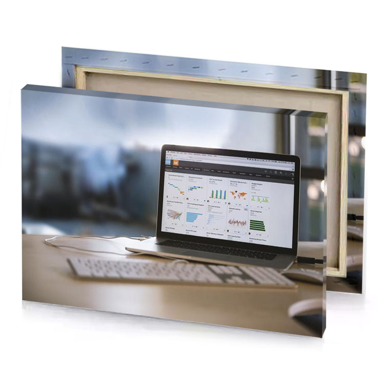 a laptop computer sitting on desk with mouse silver canvas
