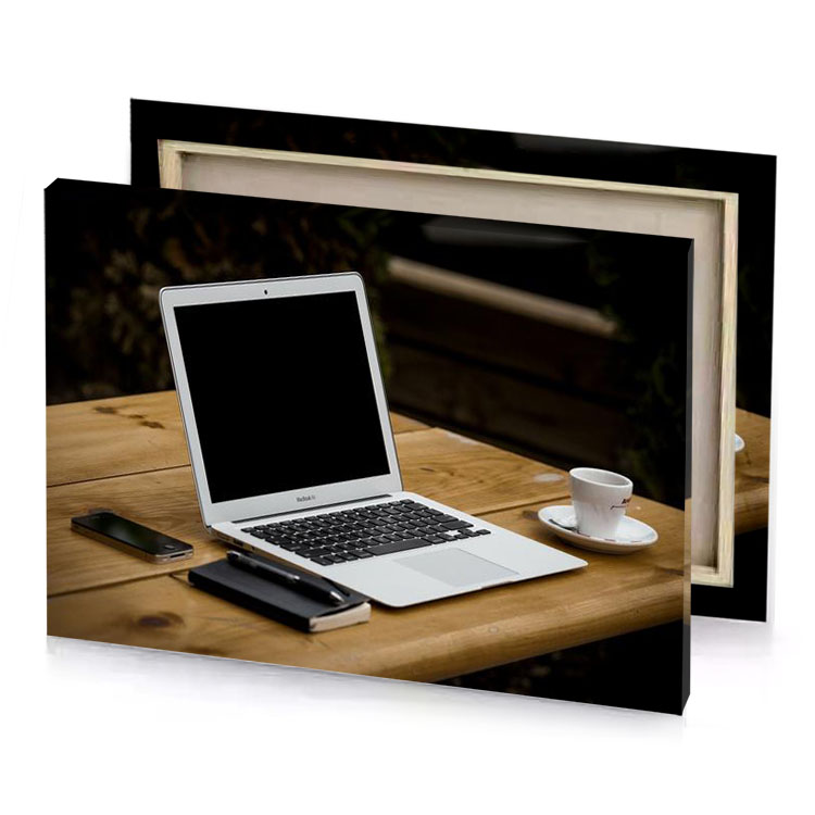 a laptop computer sitting on wooden table copper canvas
