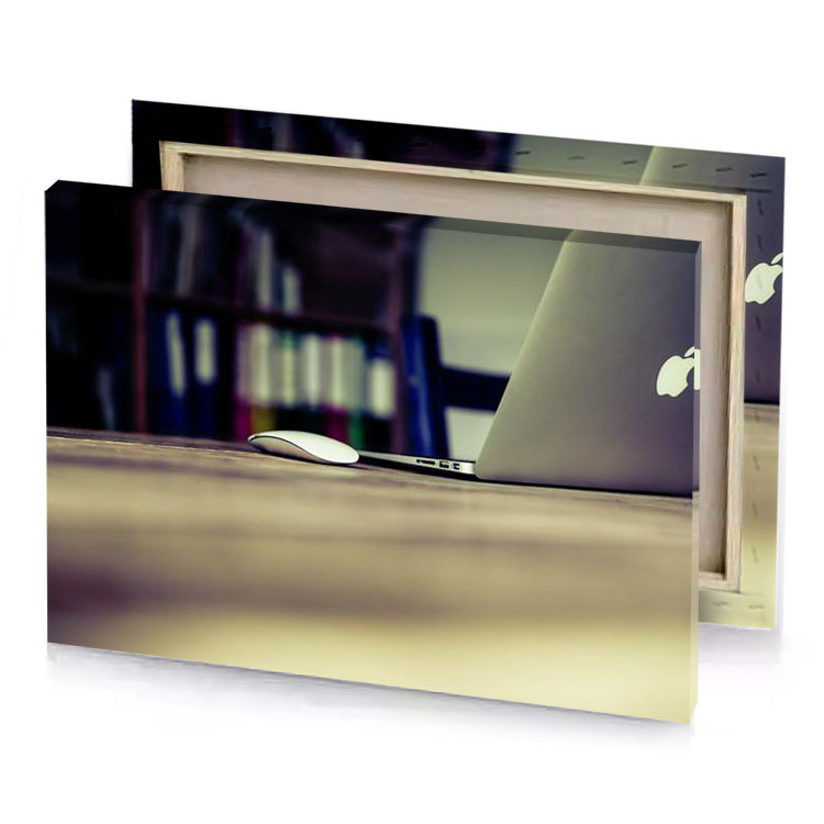 a laptop computer sitting on wooden table rosy brown canvas