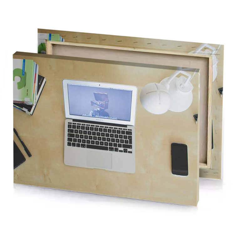 a laptop phone and other items on desk manatee canvas
