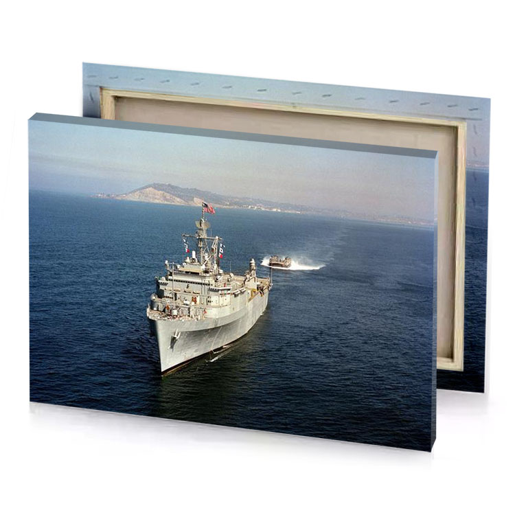 a large boat in the water silver canvas