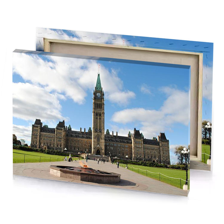a large building with clock tower light steel blue canvas