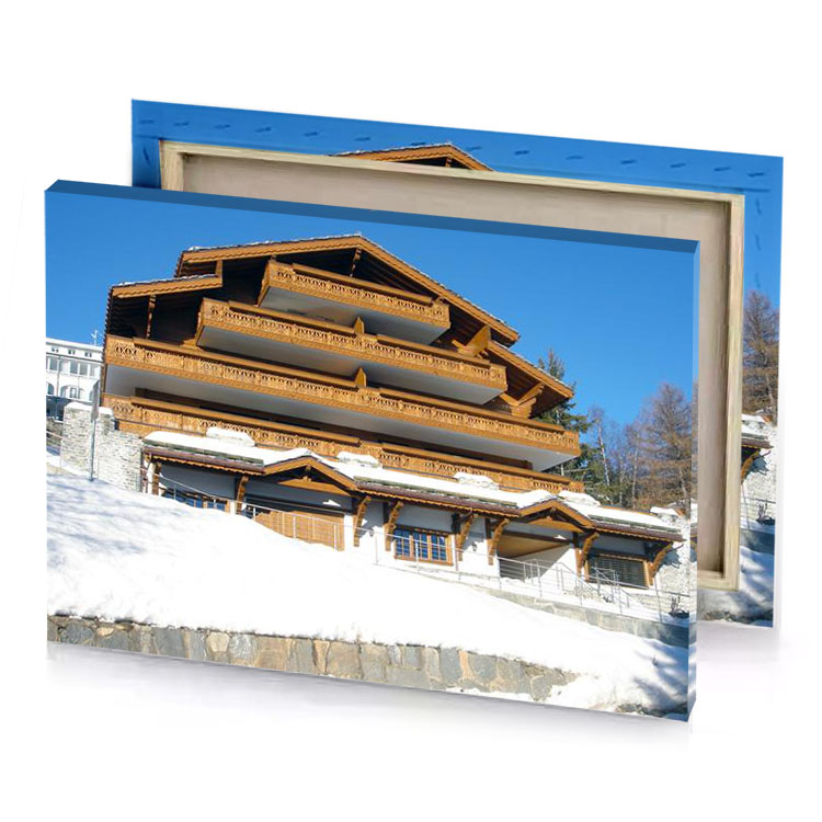 a large building with lot of snow on the ground peru canvas