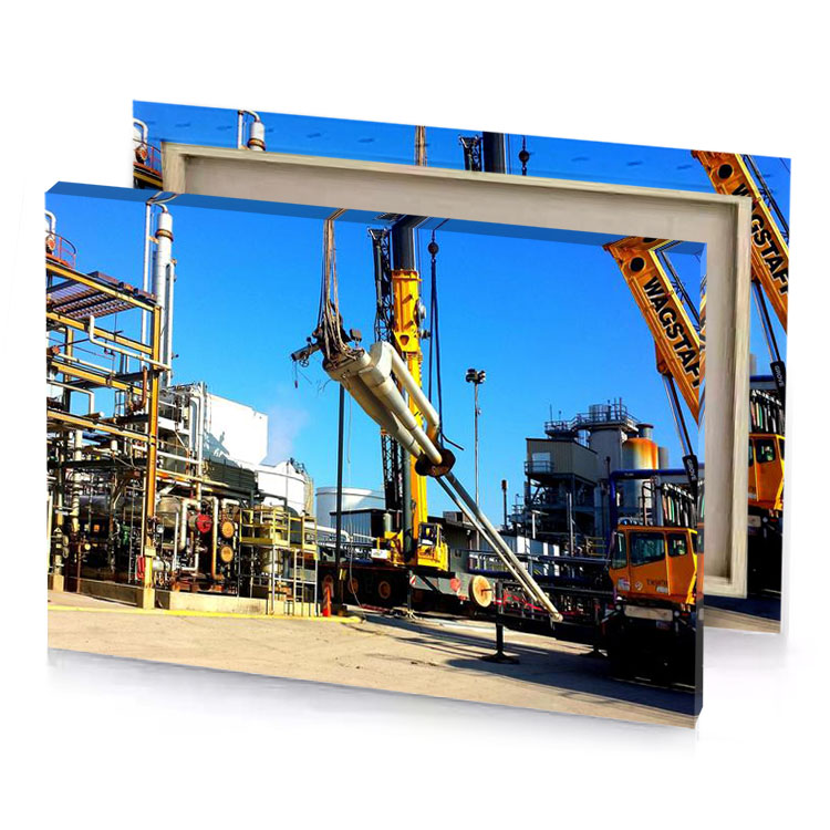 a large crane is in the middle of industrial area blue jeans canvas