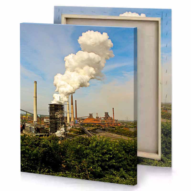 a large factory with lot of smoke coming from it champagne canvas