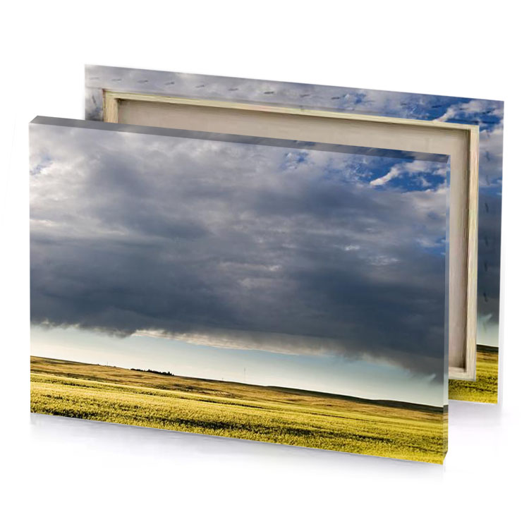 a large field with cloud in the sky gray canvas