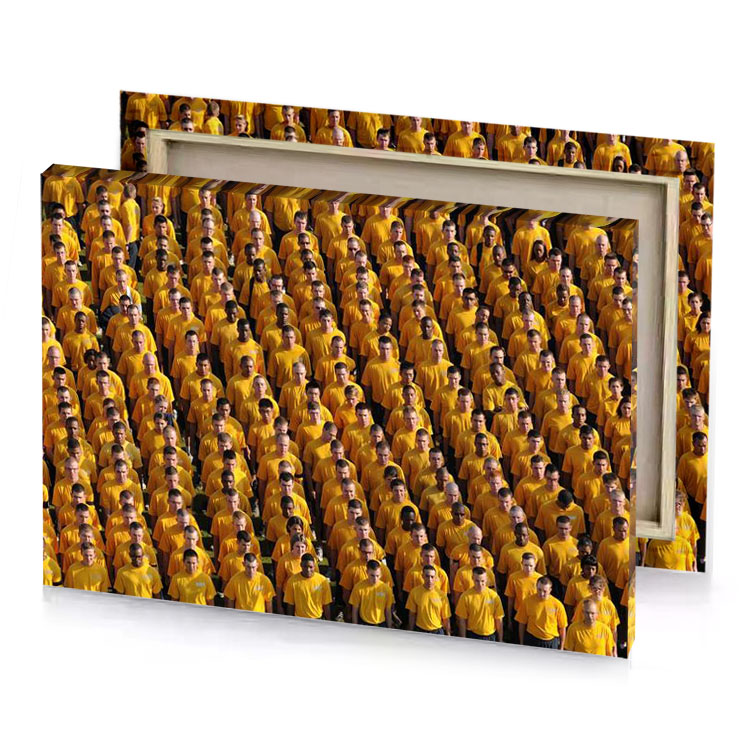 a large group of people in yellow shirts sepia canvas