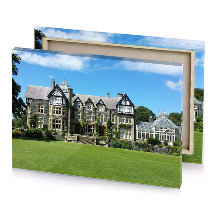 a large house with lawn in front blue jeans canvas