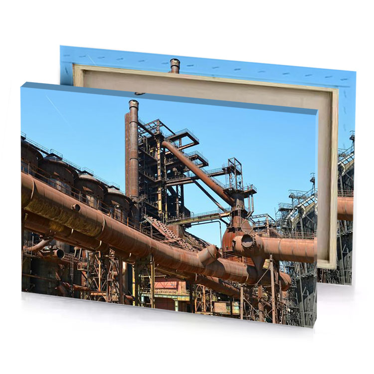 a large metal plant with lot of pipes pale turquoise canvas