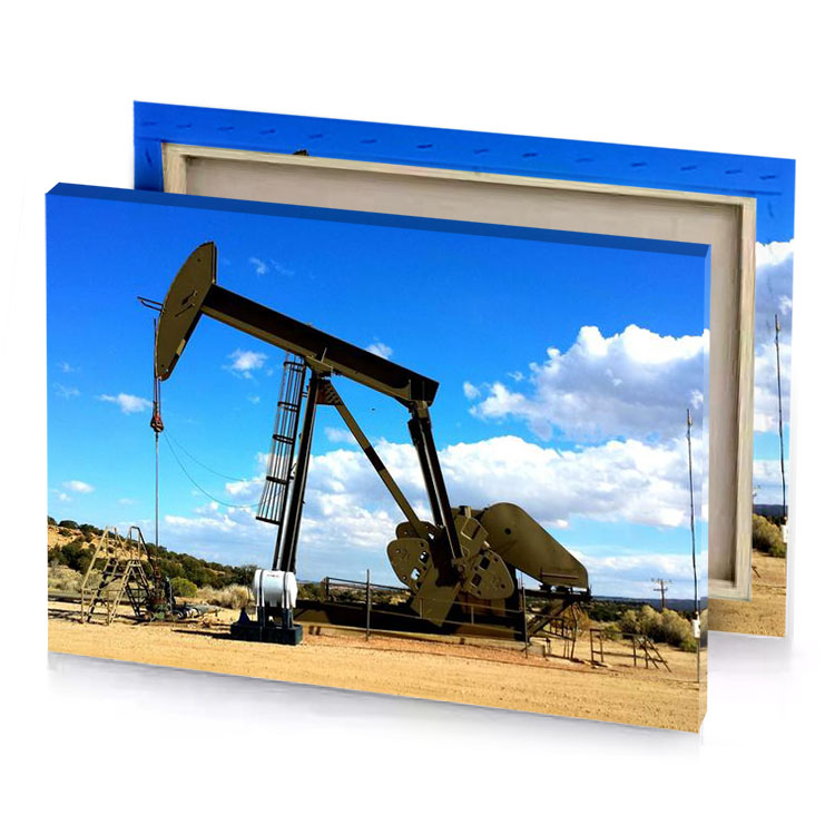 a large oil pump in the middle of desert dodger blue canvas