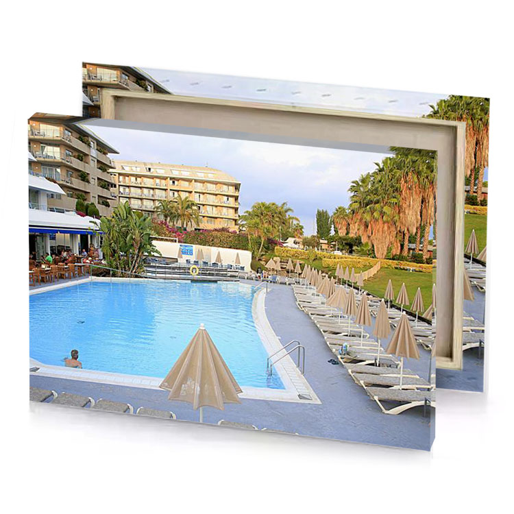 a large pool with chairs and umbrellas light steel blue canvas