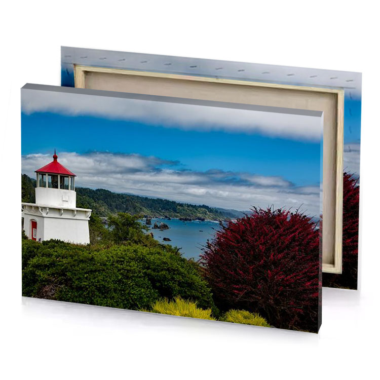 a lighthouse on hill overlooking the ocean steel blue canvas