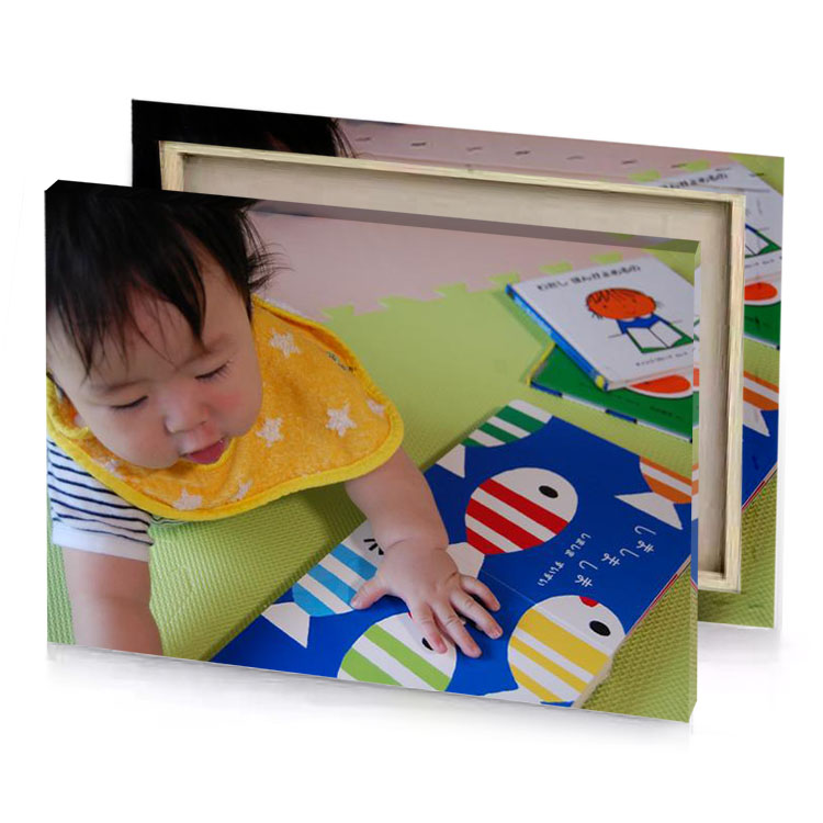 a little boy is playing with book bronze canvas