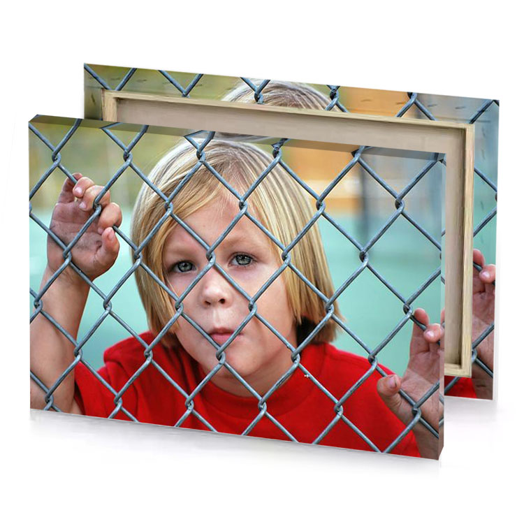 a little girl behind fence looking at the camera dark red canvas