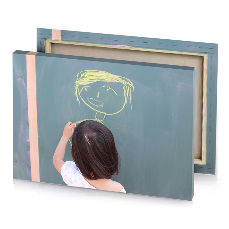 a little girl drawing on chalk board taupe canvas