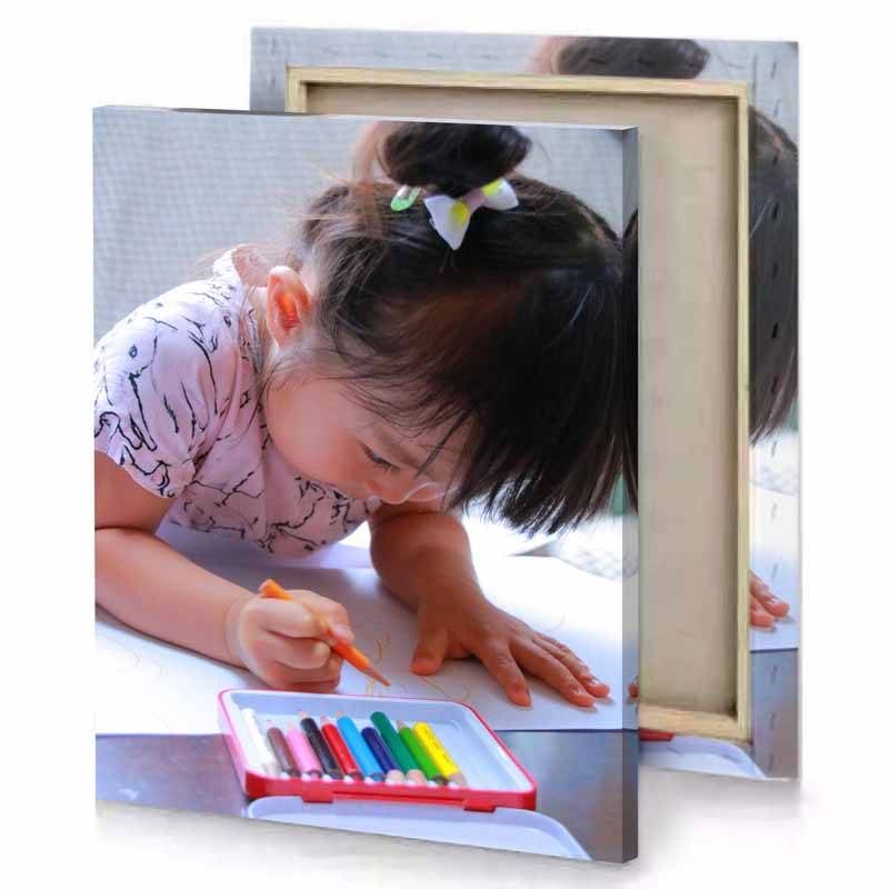 a little girl is drawing with crayo pencils mountbatten pink canvas