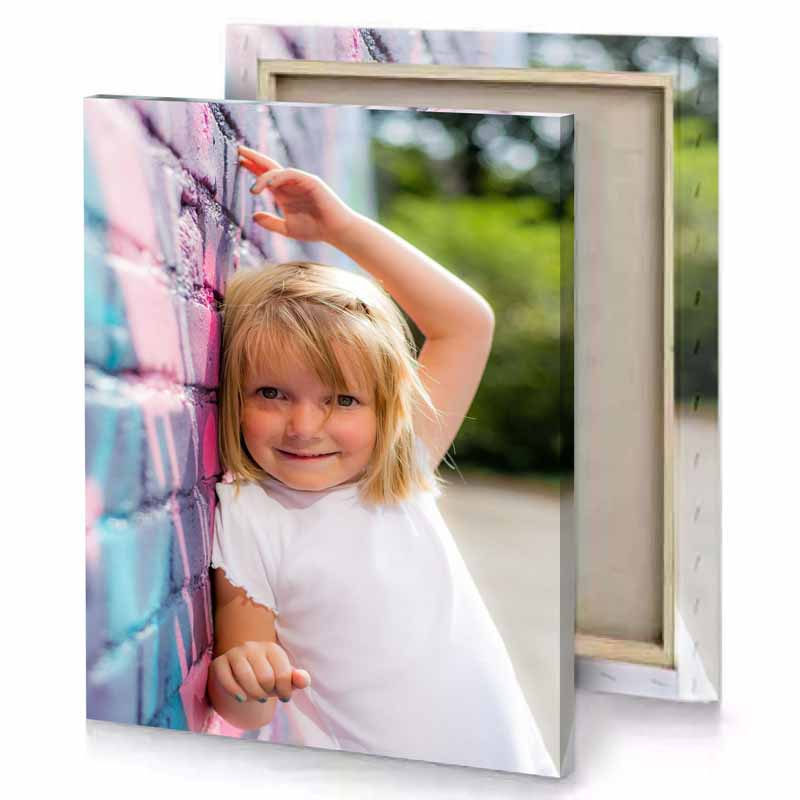 a little girl leaning against wall platinum canvas