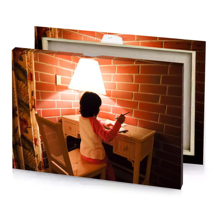 a little girl sitting at desk with laptop copper canvas