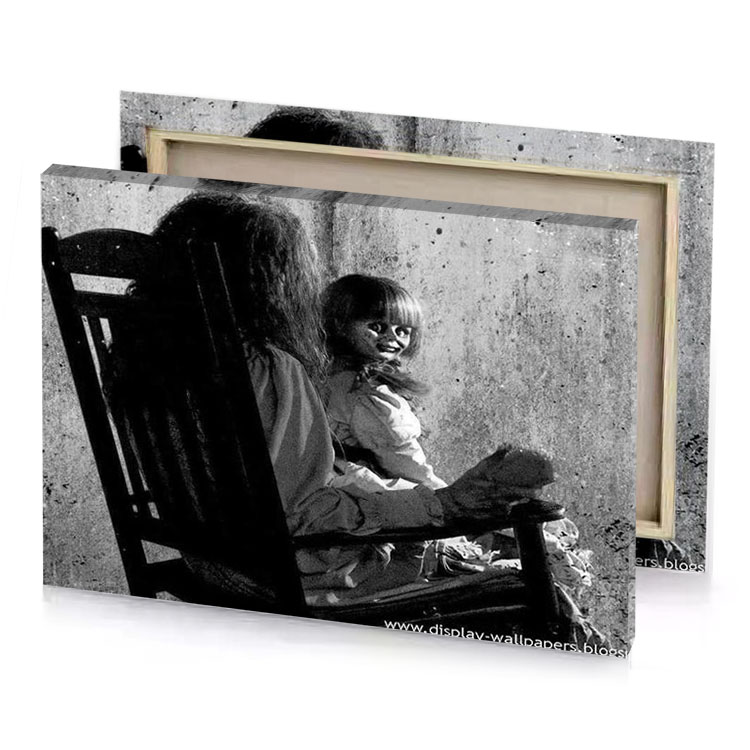 a little girl sitting in chair with her doll smoky black canvas