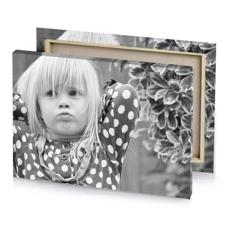 a little girl with blonde hair and polka dot dress gray canvas