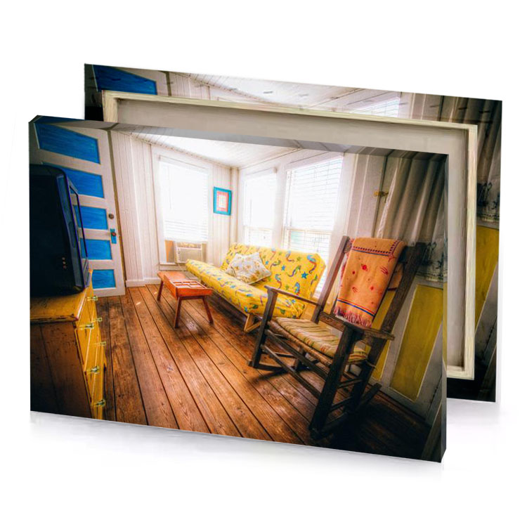a living room with couch and television smoky black canvas