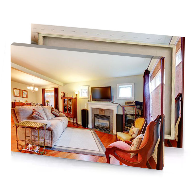 a living room with couch chair and fireplace burlywood canvas