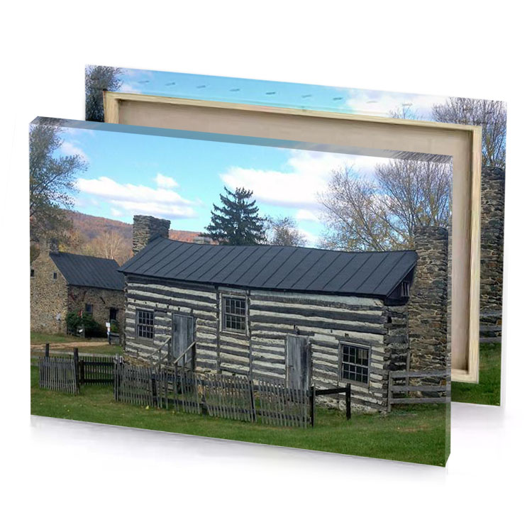 a log cabin with black roof and fence charcoal canvas