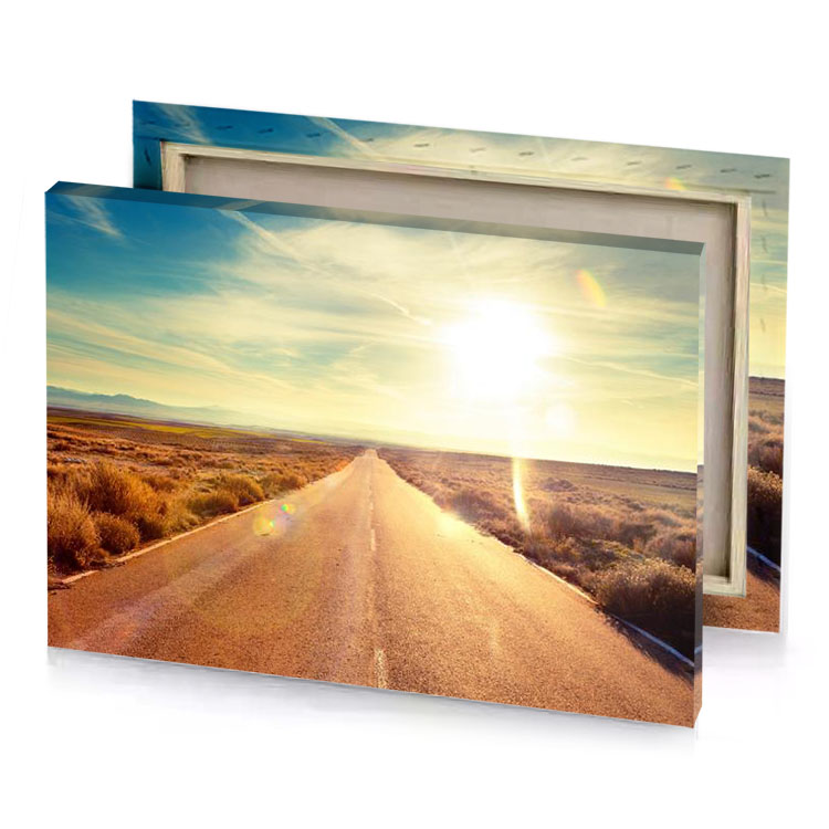 a long road with bright sun shining through the clouds champagne canvas