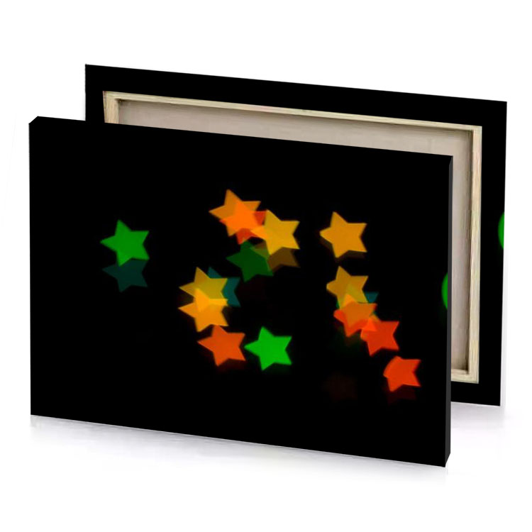 a lot of colorful stars rotating on black background tangerine canvas