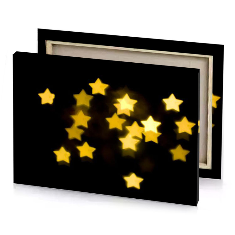 a lot of yellow stars rotating in the dark amber canvas