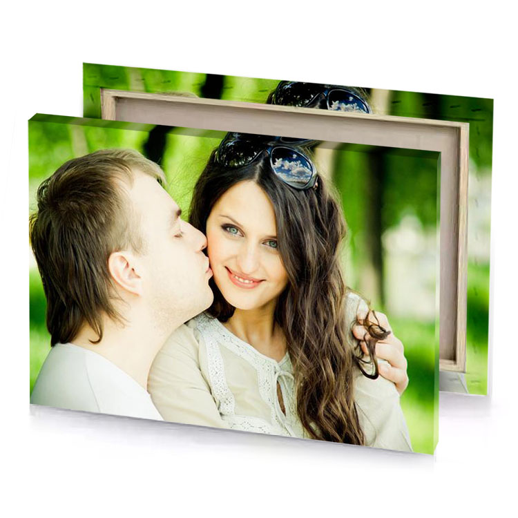 a man and woman are kissing in the park pearl canvas