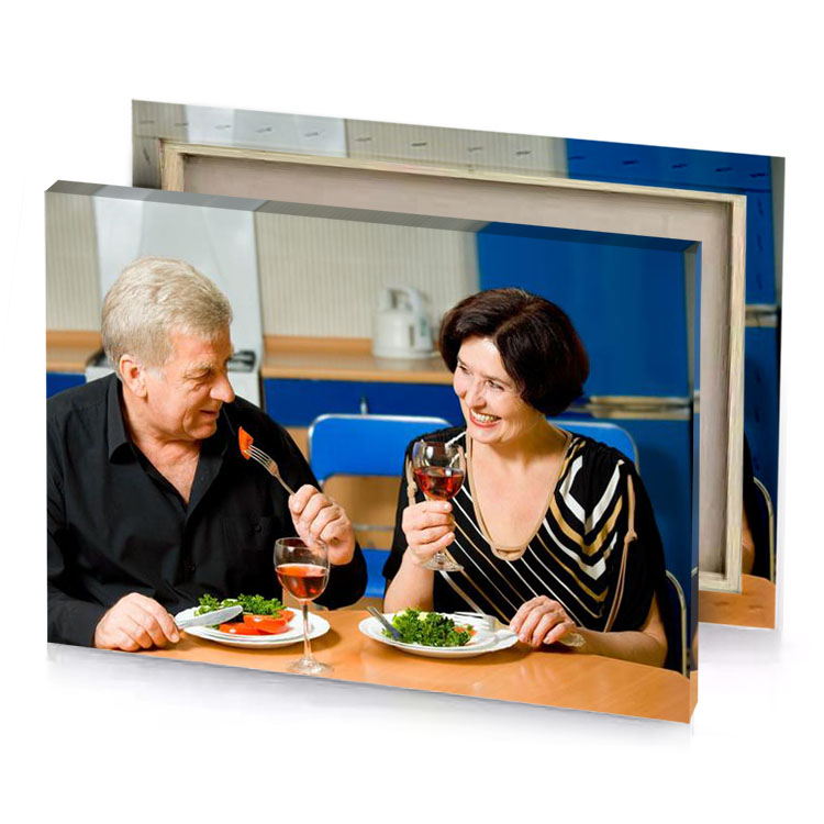 a man and woman eating food at table smoky black canvas