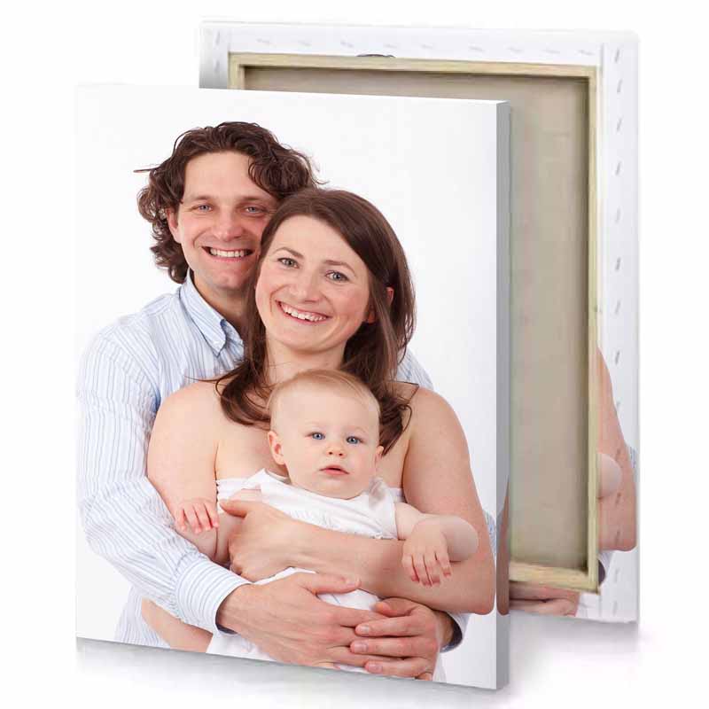 a man and woman holding baby white smoke canvas