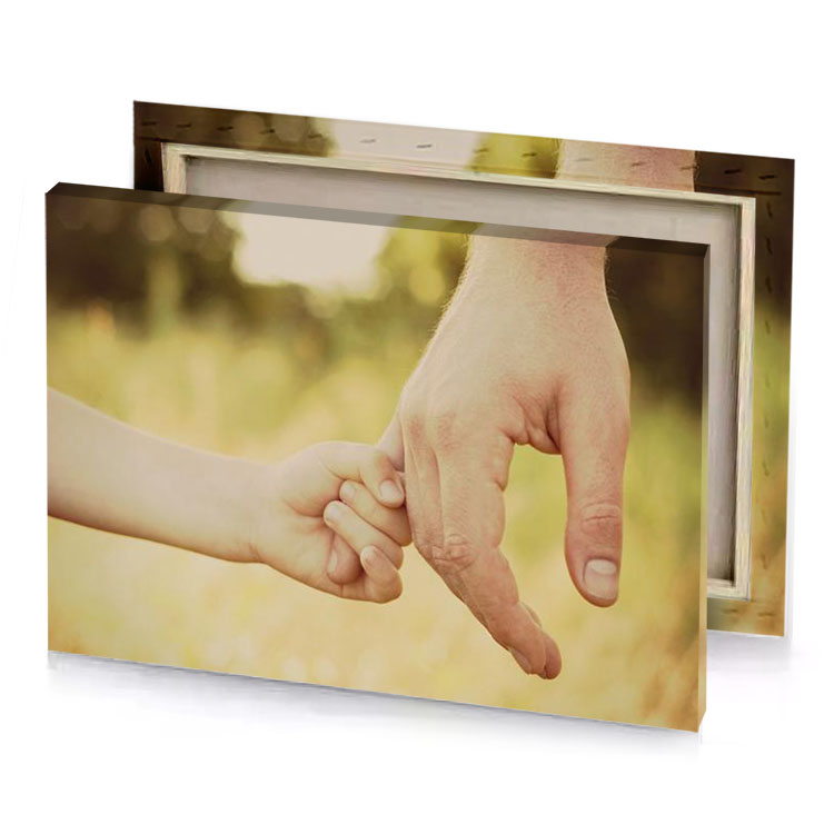 a man and woman holding hands in field tan canvas