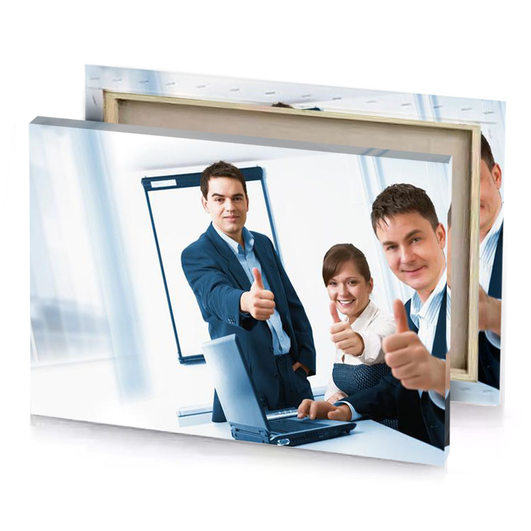 a man and woman in business attire pointing at the lavender canvas