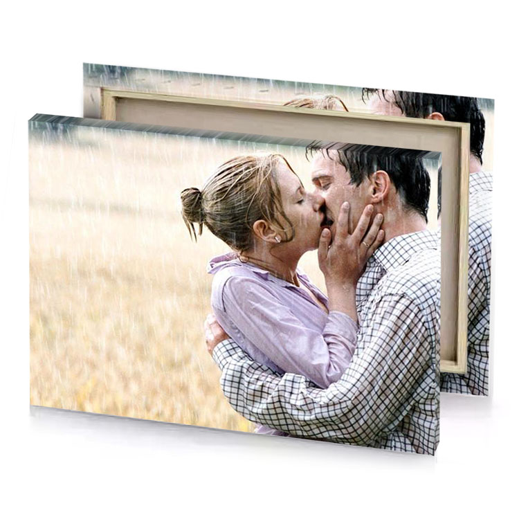 a man and woman kissing in the rain champagne canvas