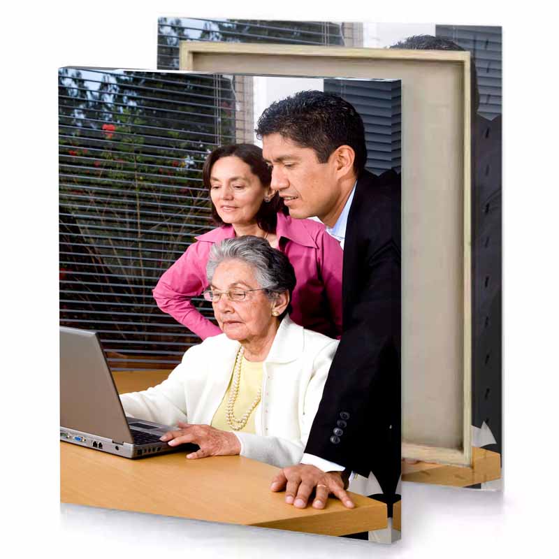 a man and woman looking at laptop smoky black canvas