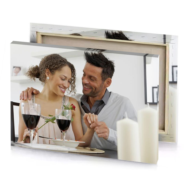 a man and woman sitting at table platinum canvas