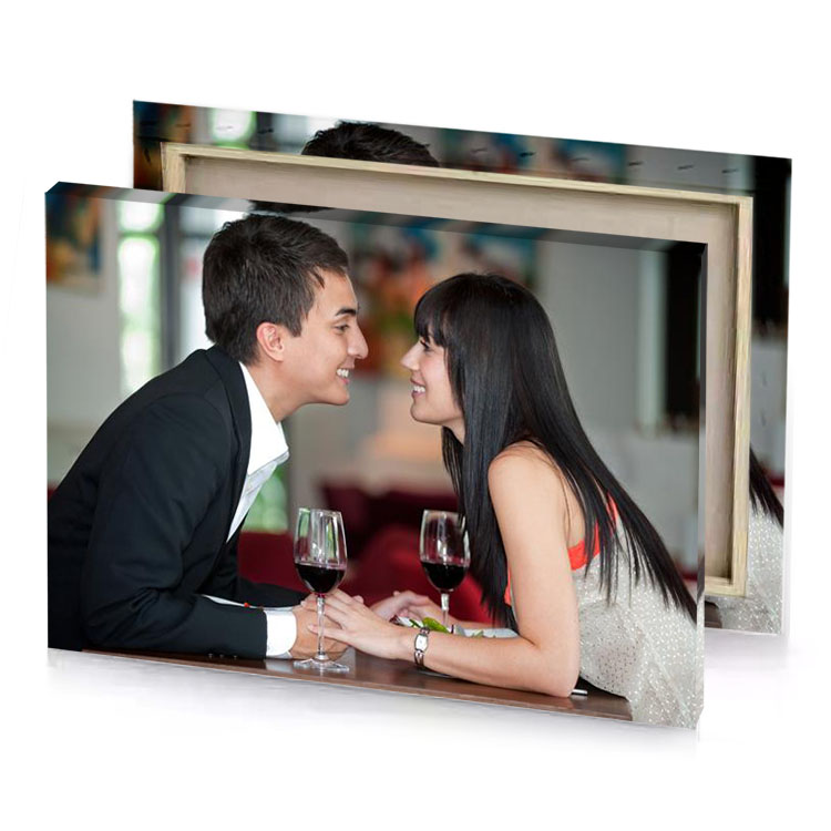 a man and woman sitting at table smoky black canvas