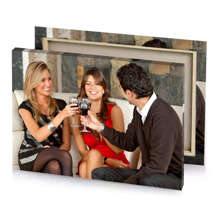 a man and woman sitting on couch bistre canvas