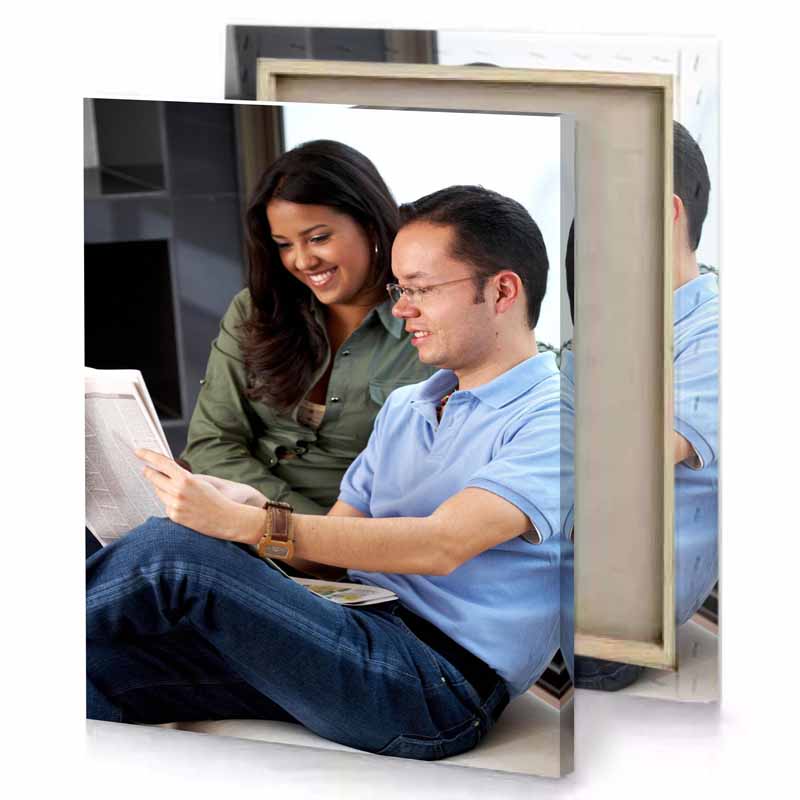 a man and woman sitting on couch reading book smoky black canvas