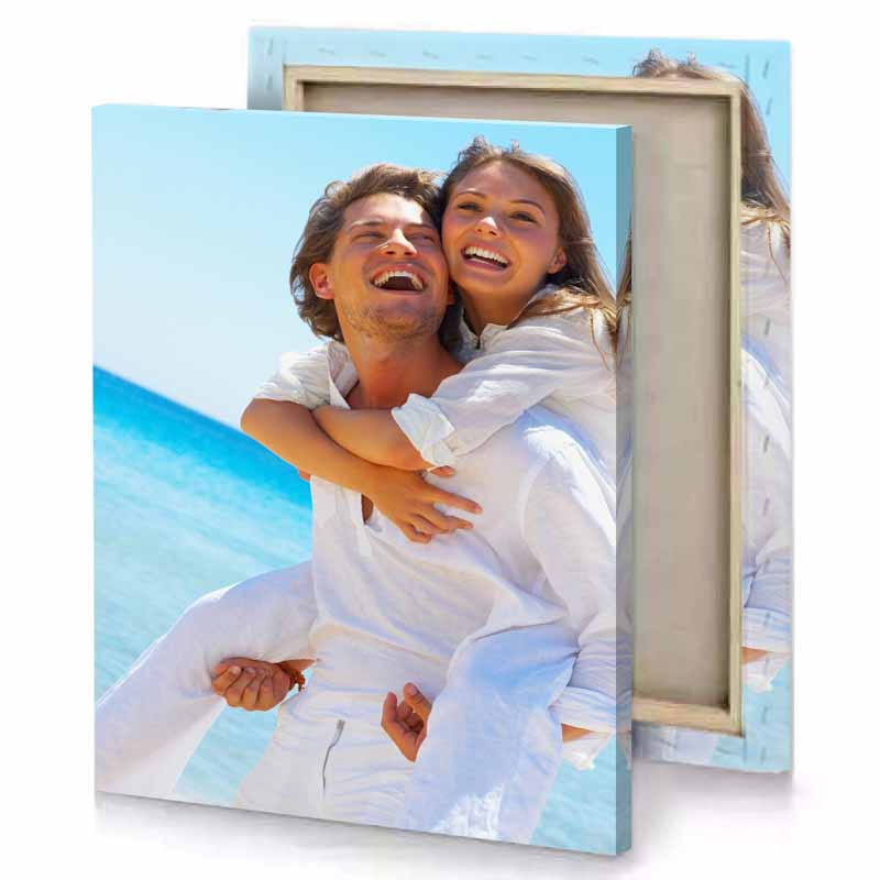 a man carrying woman light blue canvas