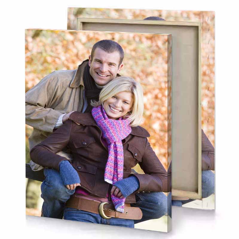 a man carrying woman on his back taupe canvas