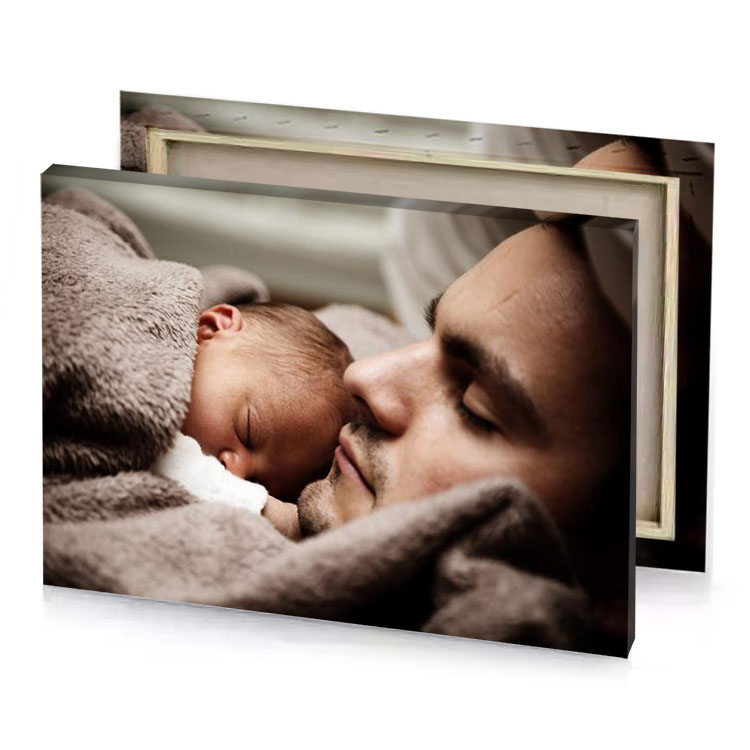 a man holding baby in his arms rosy brown canvas