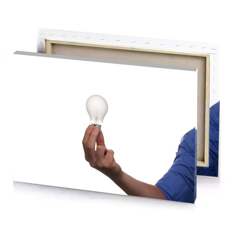 a man holding light bulb in his hand camouflage green canvas
