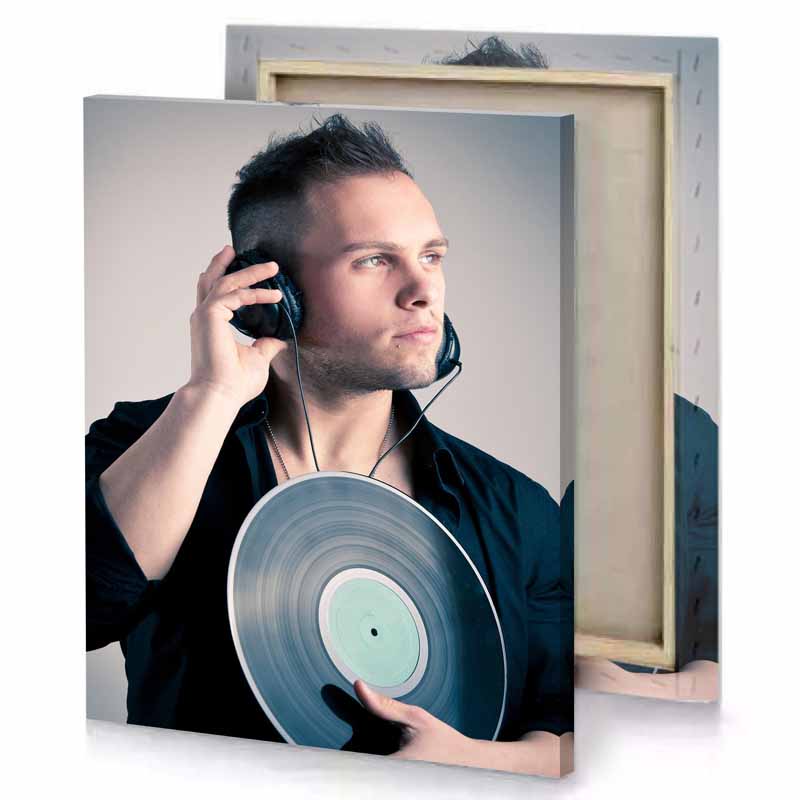a man holding record with headphone manatee canvas