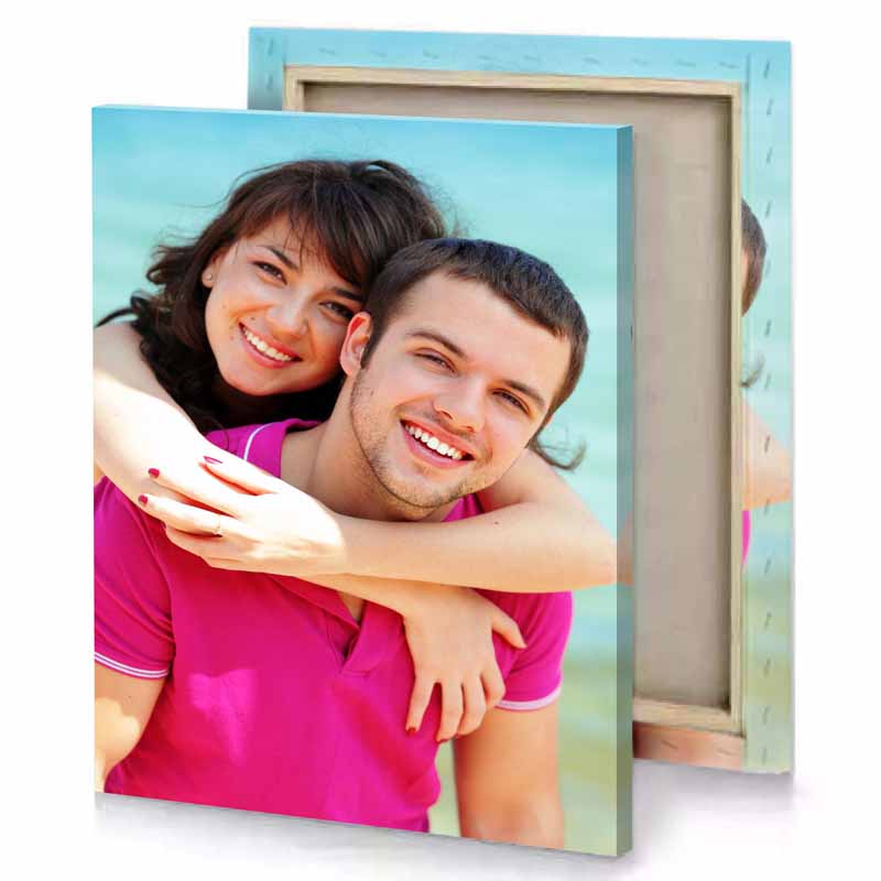 a man holding woman sky blue canvas