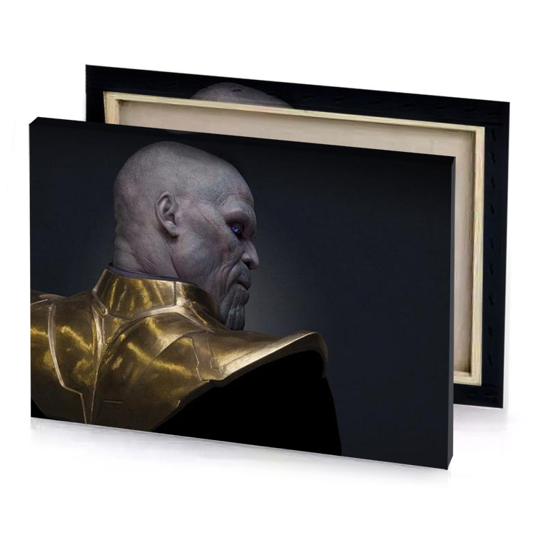 a man in black shirt with gold collar taupe canvas